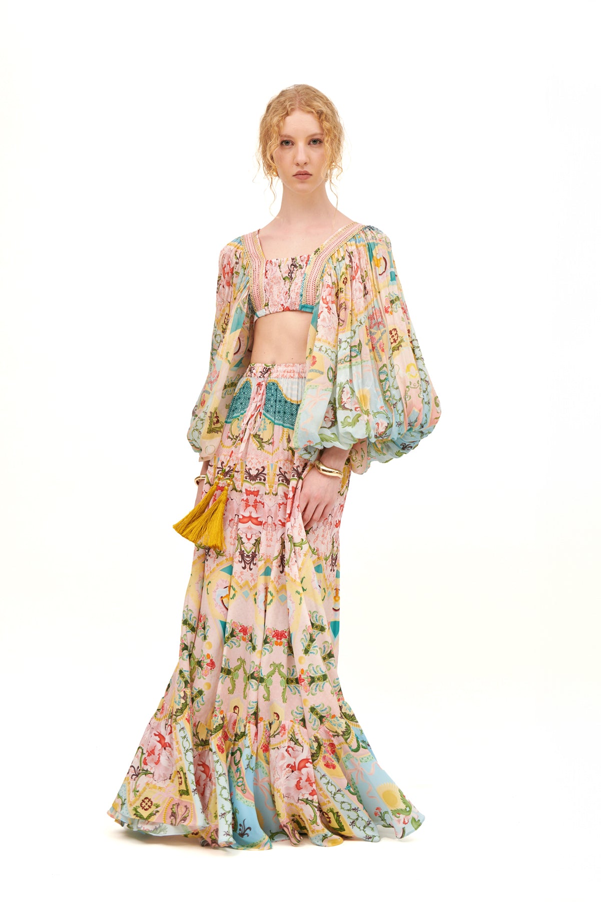 Gathered long sleeves top with a flattering fit and elegant design for a chic, feminine look.