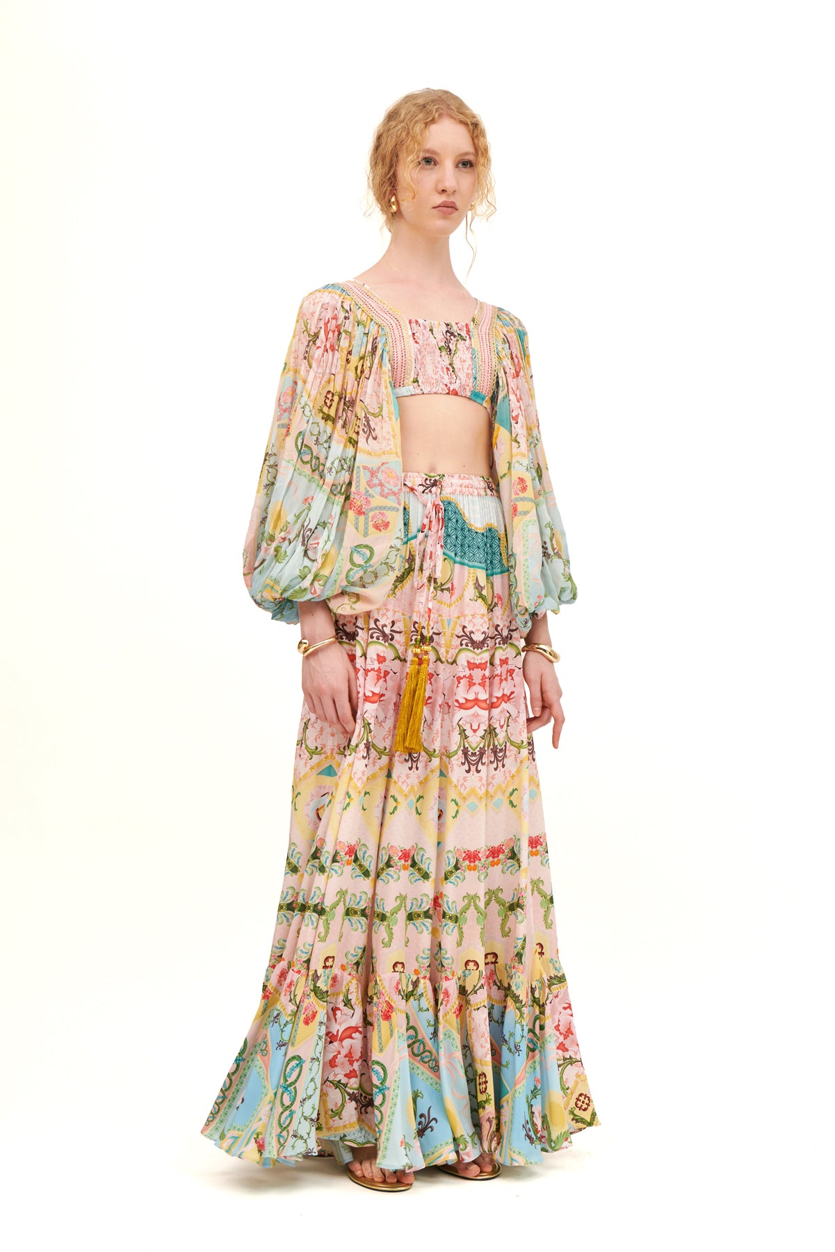 Gathered long sleeves top with a flattering fit and elegant design for a chic, feminine look.