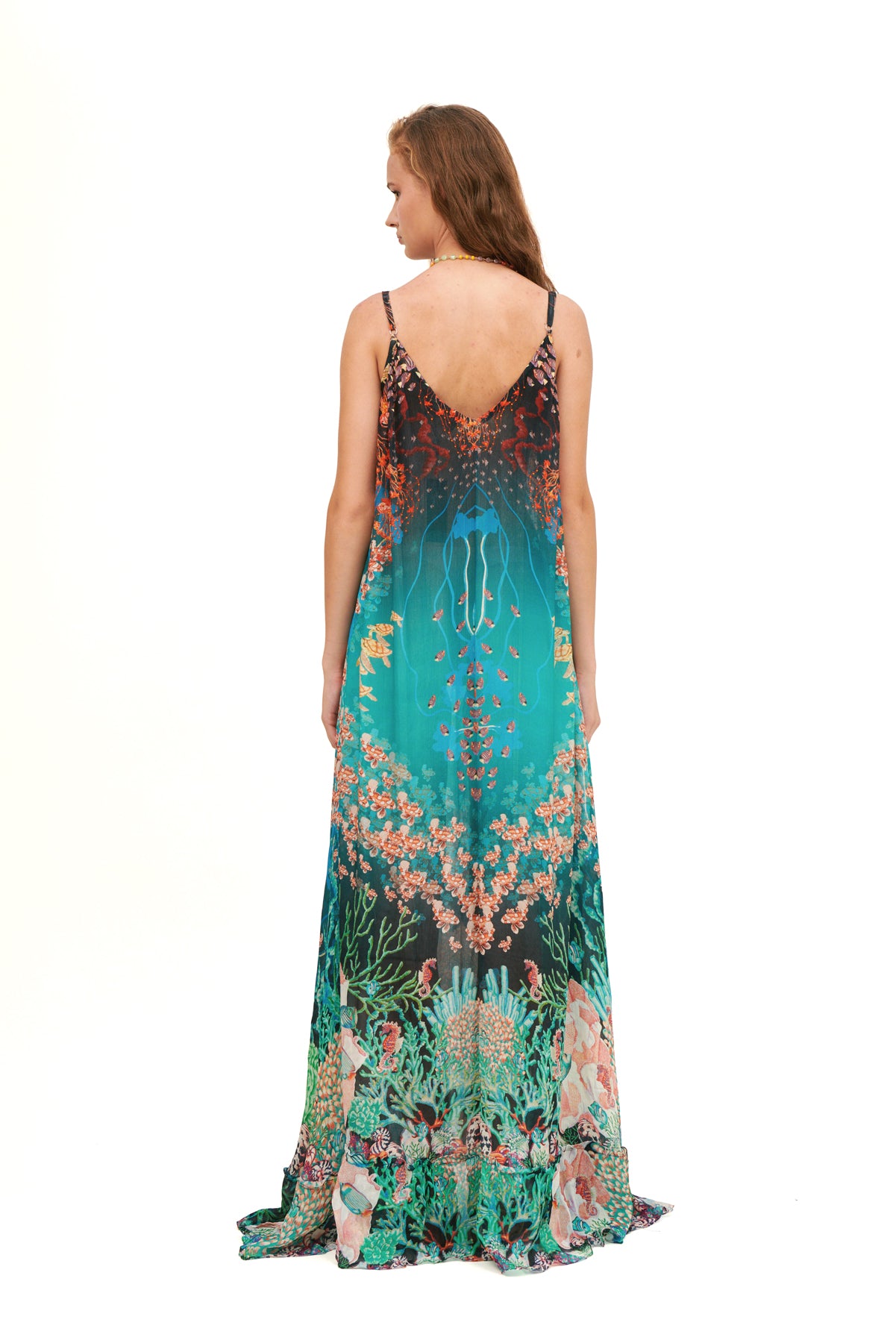 Flared V-neck dress with a flowing silhouette and flattering fit.