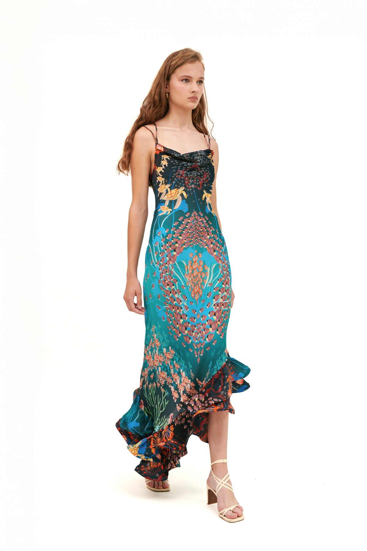 Long dress with curled hem detail.