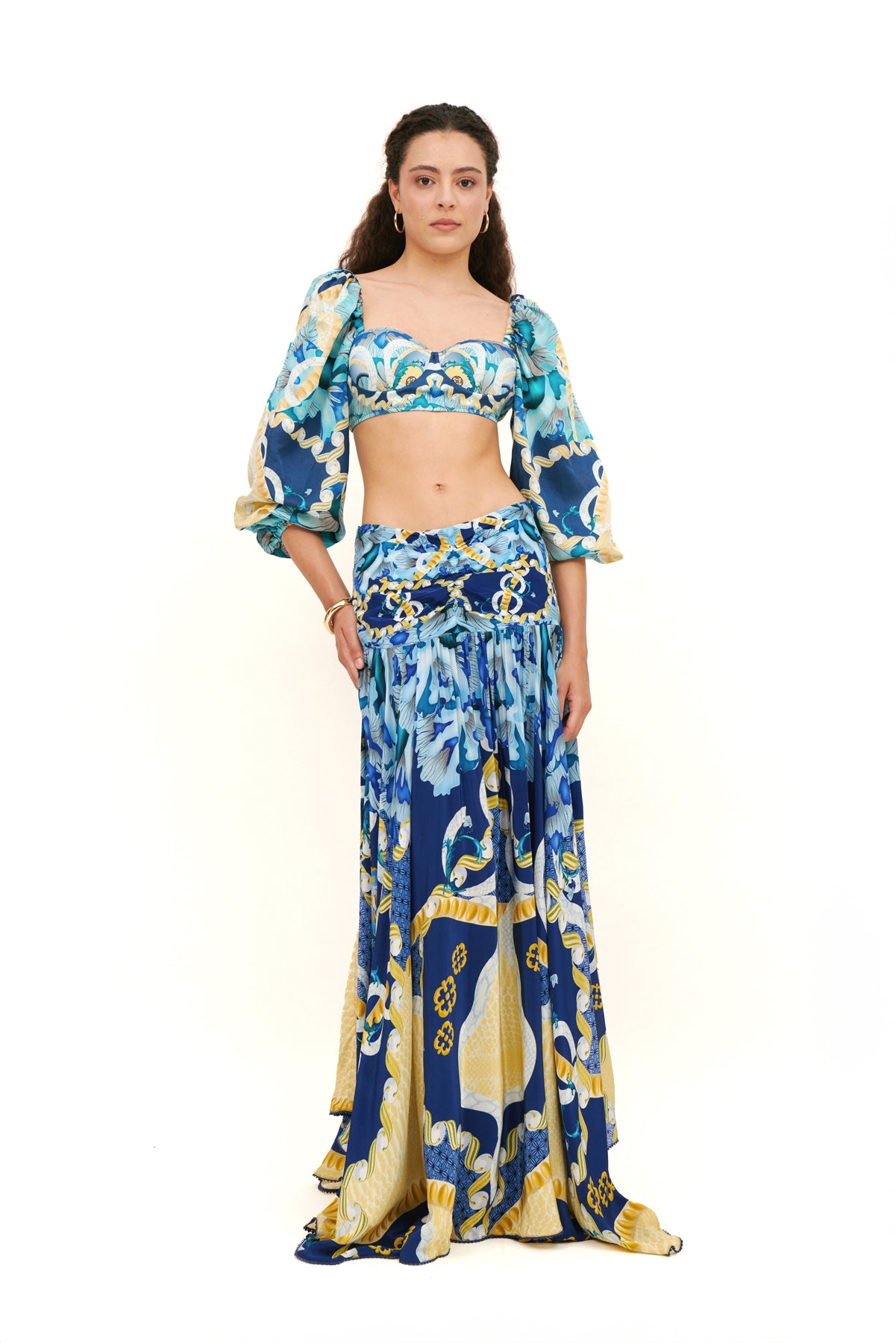 Bra top with puffy sleeves, offering a feminine silhouette and playful design for a chic, stylish look.