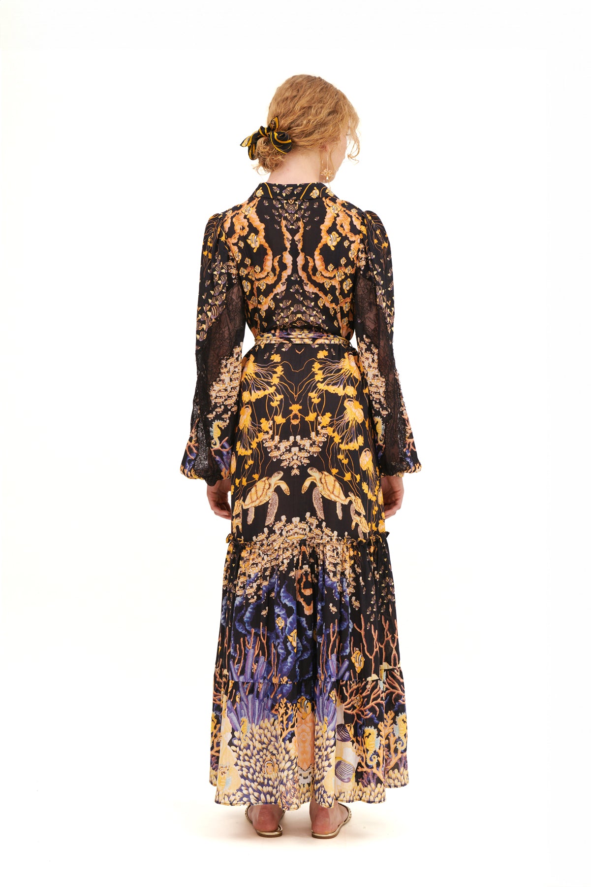 Chemisier with lace sleeve inserts for a chic and feminine touch.