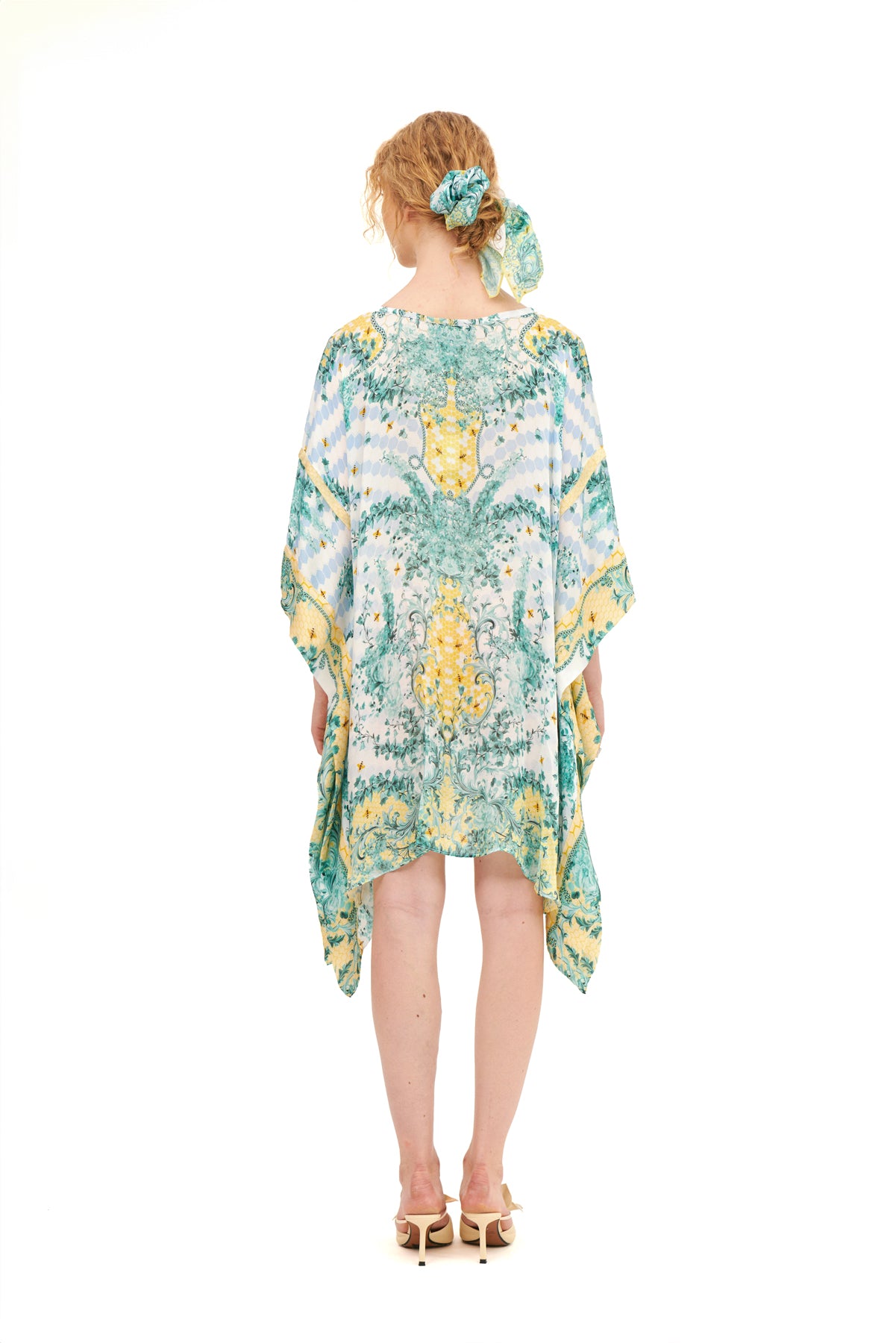 Yolka square kaftan with a relaxed fit and elegant design, perfect for effortless style.