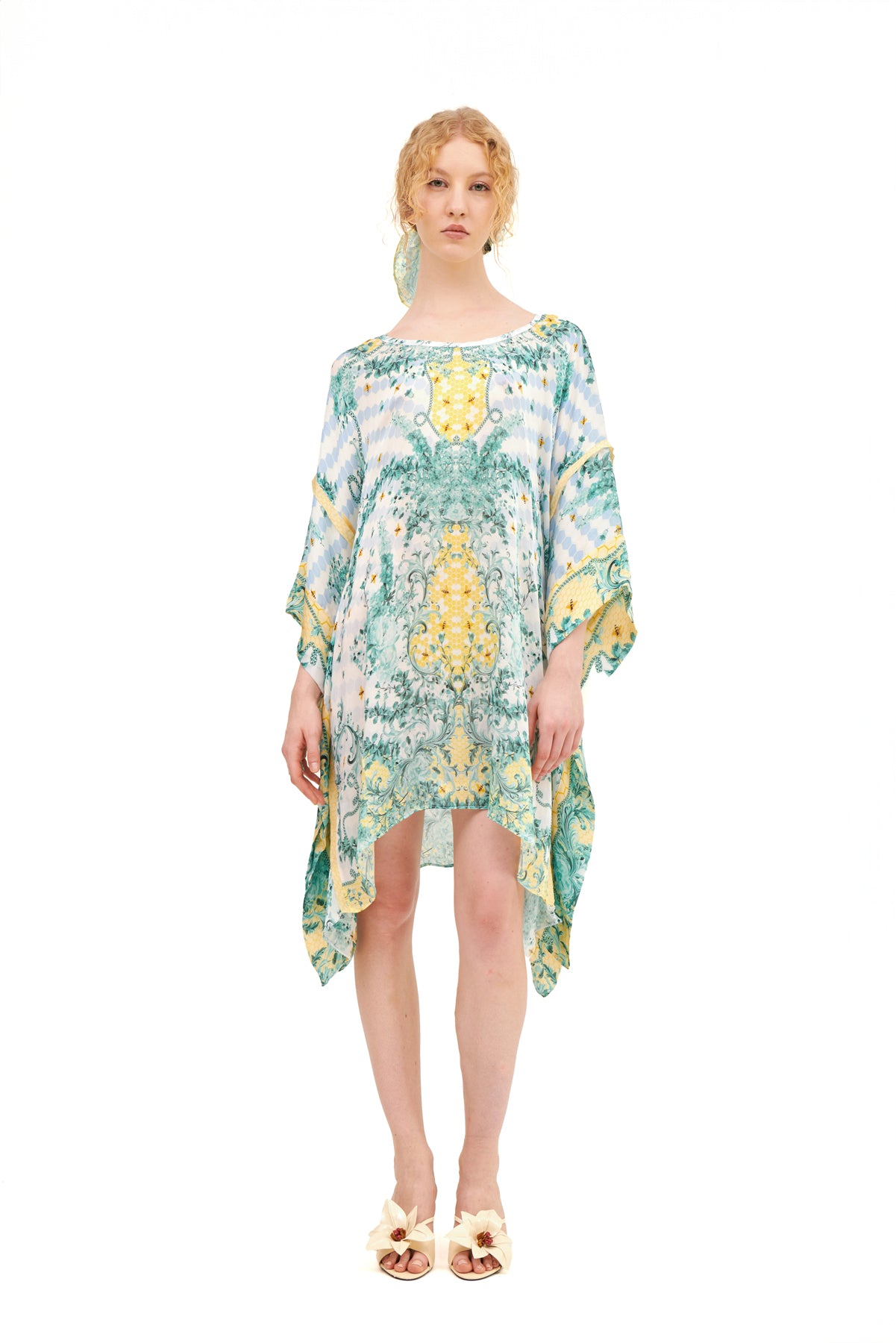 Yolka square kaftan with a relaxed fit and elegant design, perfect for effortless style.