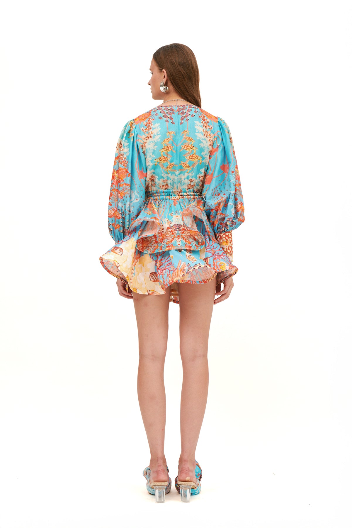 Aria mini dress with a flattering fit and playful design, perfect for casual outings or special occasions.