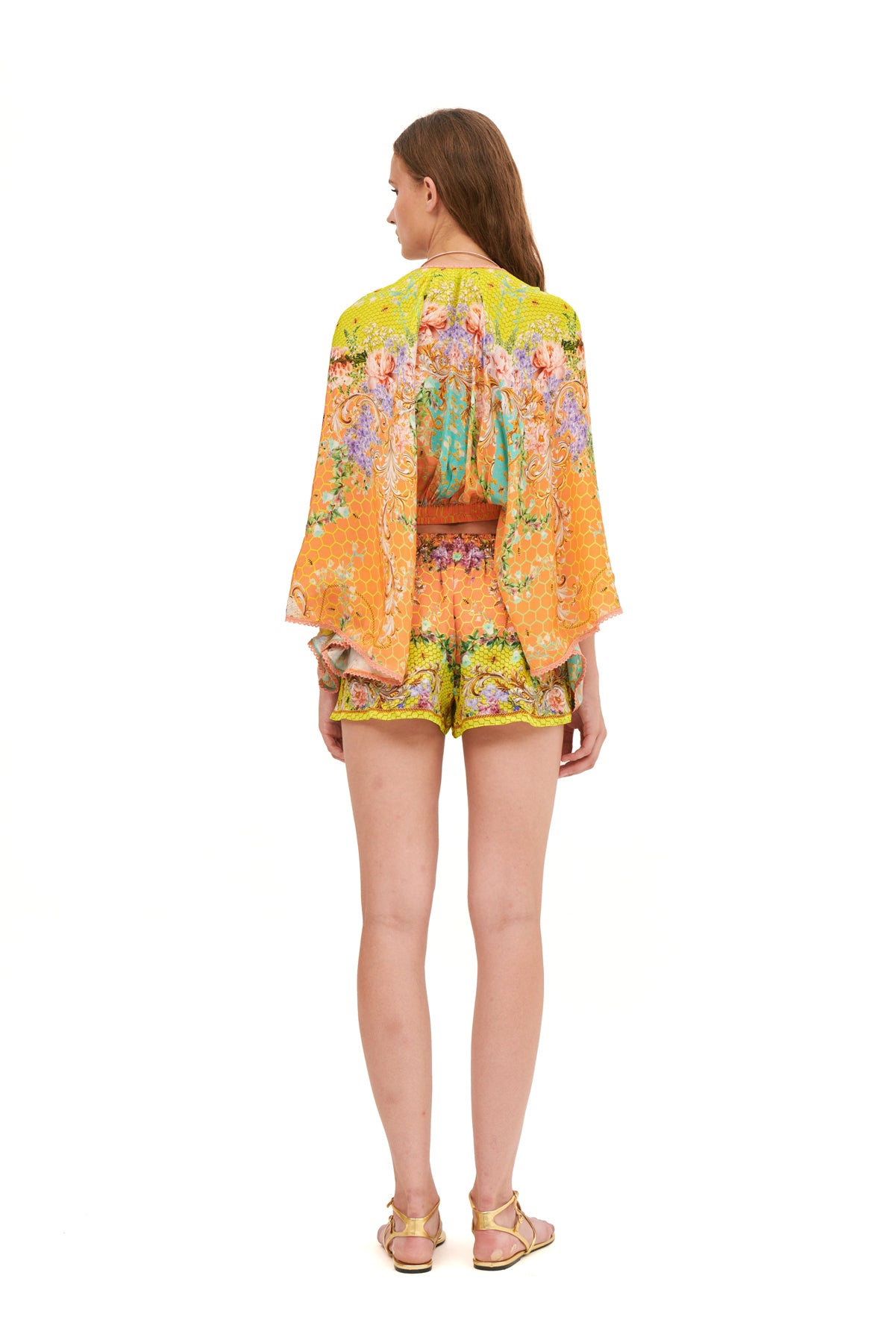 Draped top with an elastic belt, featuring a flattering fit and elegant design for a chic, comfortable look.