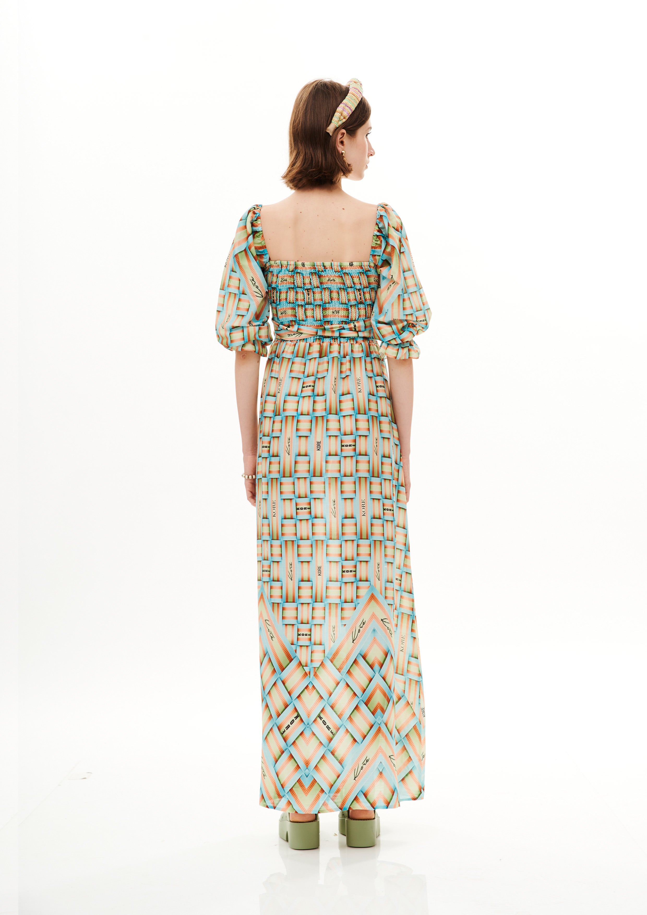 Bra knot bobbing long dress in Chandery with "Monogram Breeze Sunrise" print.
