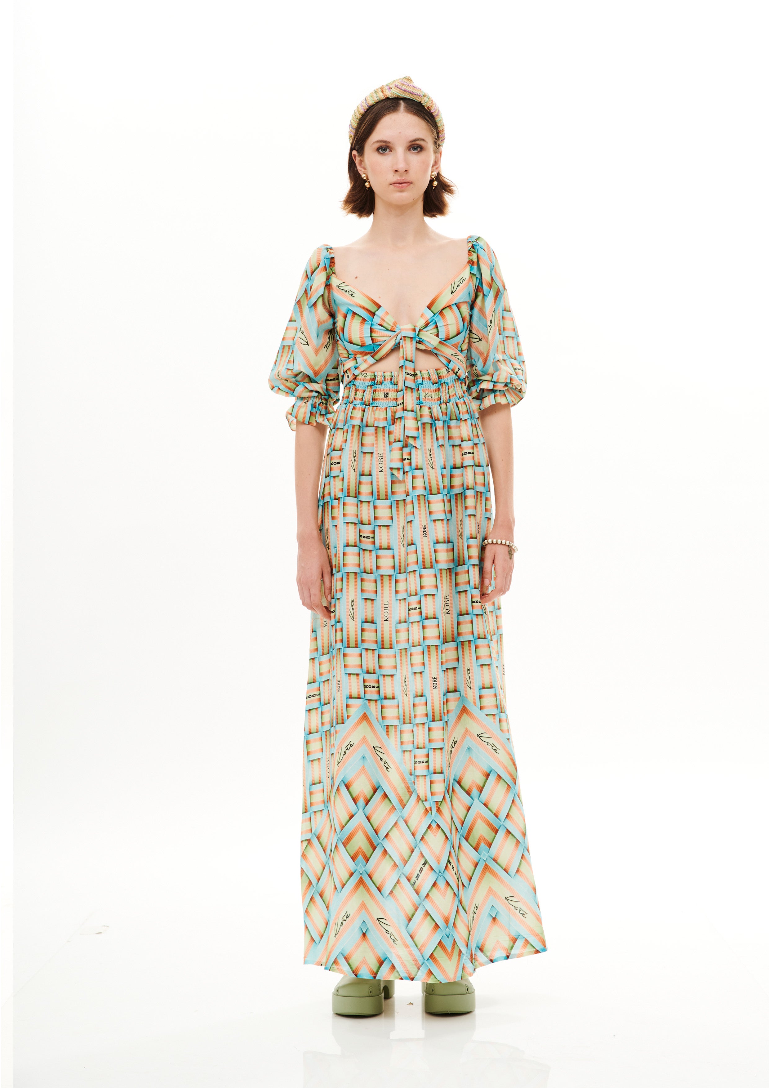 Bra knot bobbing long dress in Chandery with "Monogram Breeze Sunrise" print.