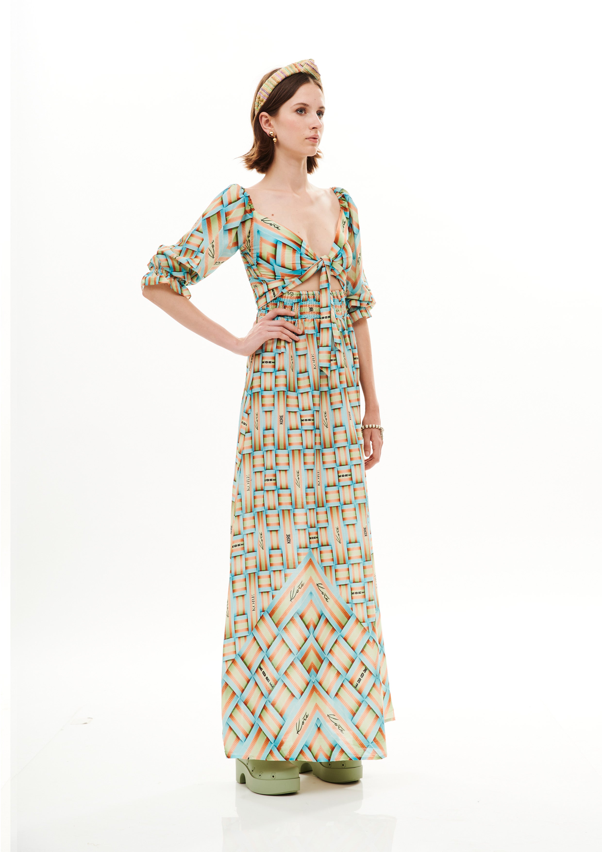 Bra knot bobbing long dress in Chandery with "Monogram Breeze Sunrise" print.