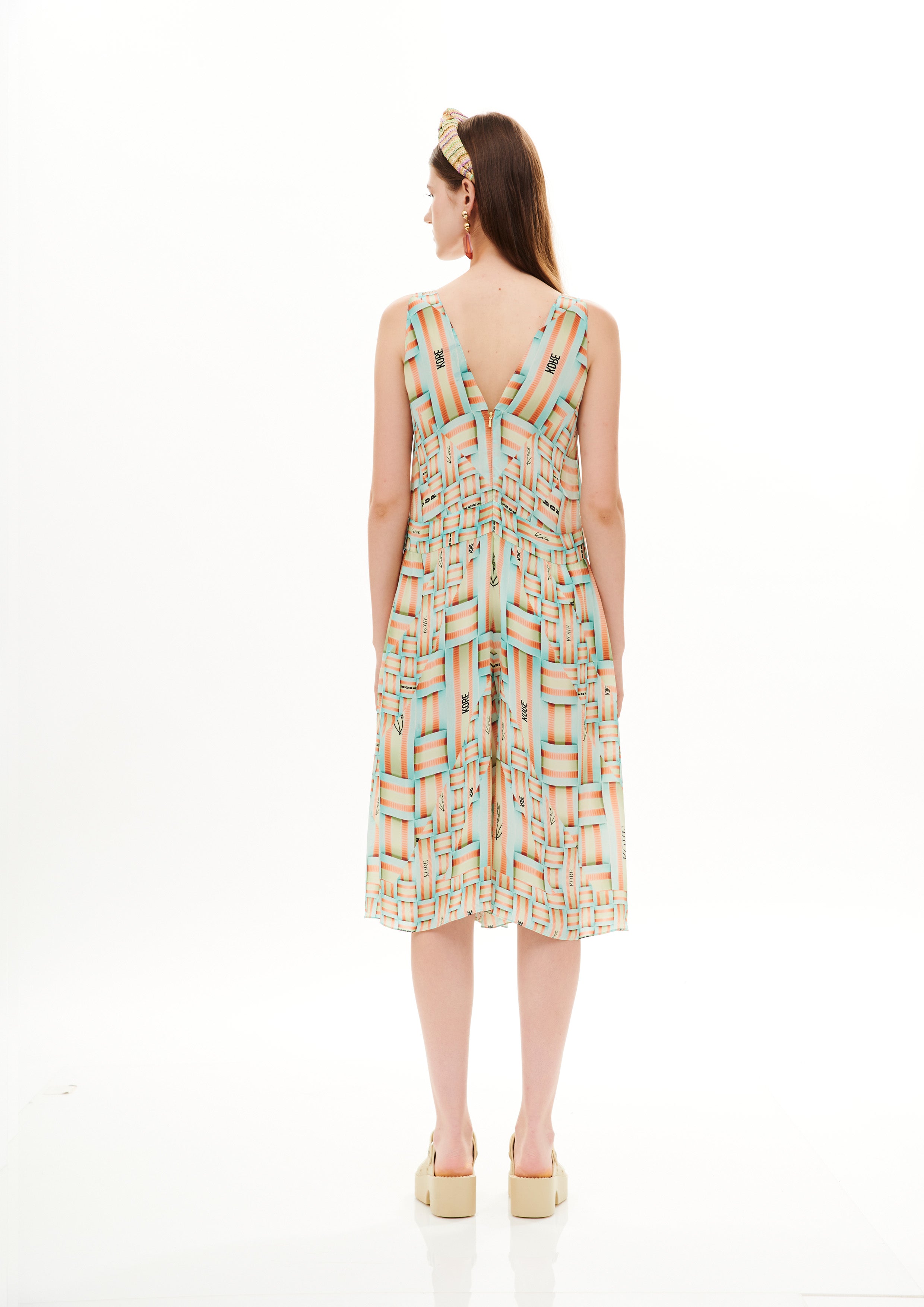 Lacing short jumpsuit in Natural Crepe with "Monogram Breeze Sunrise" print.