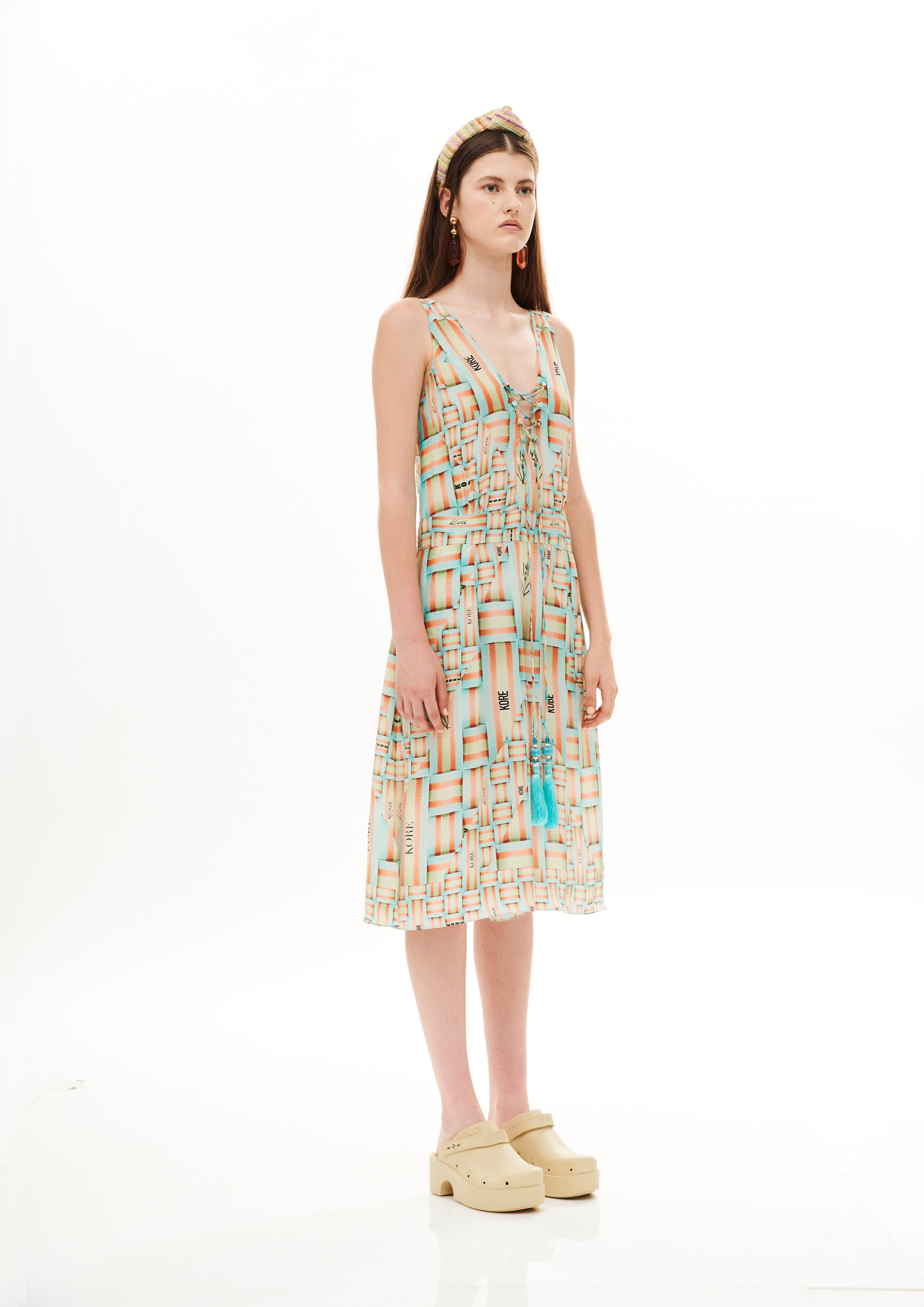 Lacing short jumpsuit in Natural Crepe with "Monogram Breeze Sunrise" print.