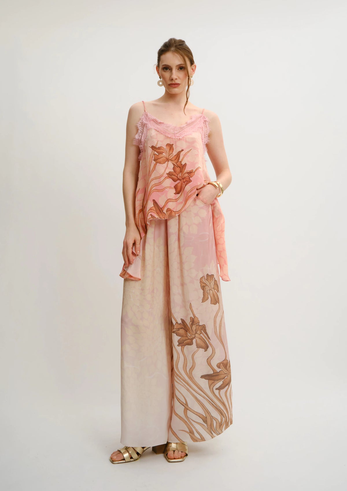 Model wearing Summer Breeze Lacy Tank Top by Koré Collections in the Jardin au Soleil floral print