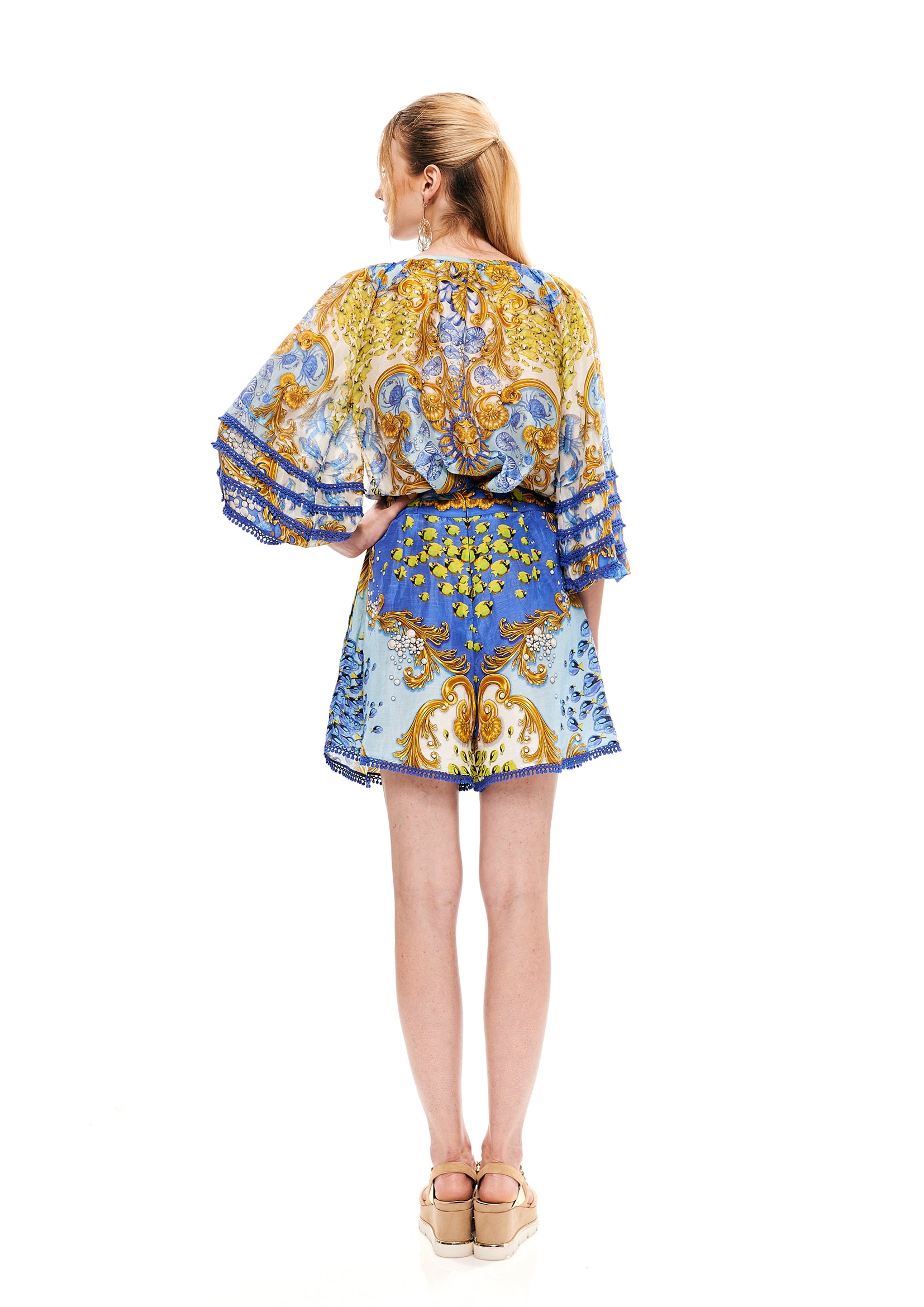 Pleated shorts in 15% Linen and 85% Viscose with "Mare Tesor Giorno" print.