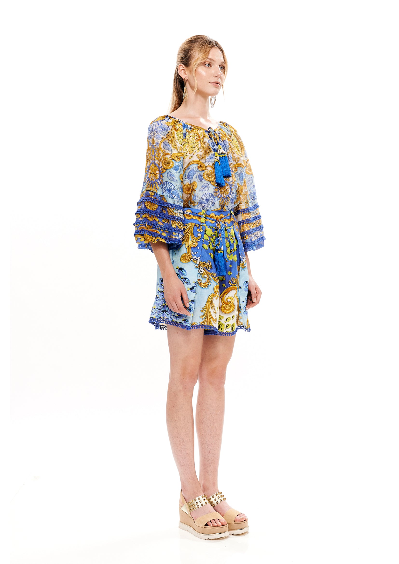 Pleated shorts in 15% Linen and 85% Viscose with "Mare Tesor Giorno" print.