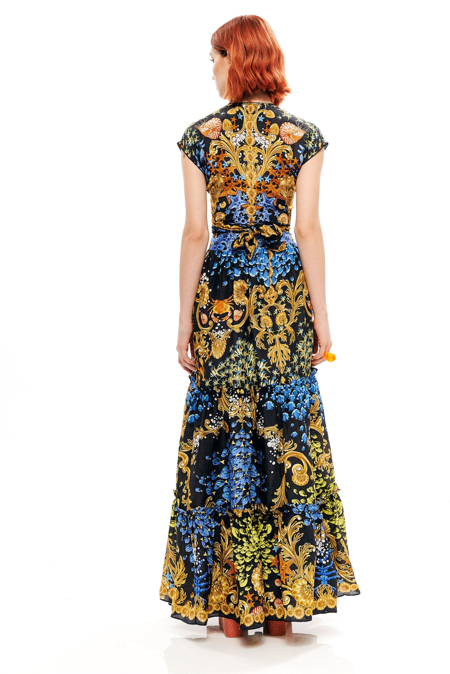 Bow draped dress with ruffles in 15% Linen and 85% Viscose with "Mare Tesor Notte" print.