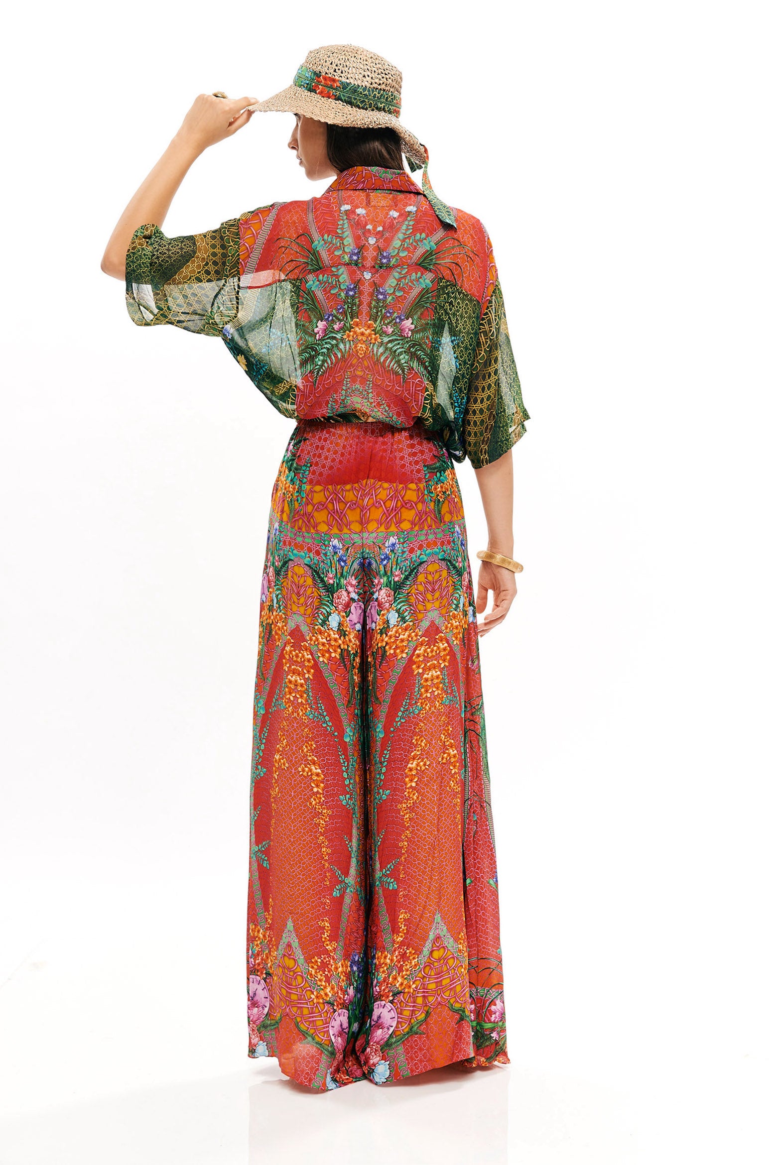 Seventies pants in 40% Silk and 60% Viscose with "Alice Garden Neon Sunset" print.