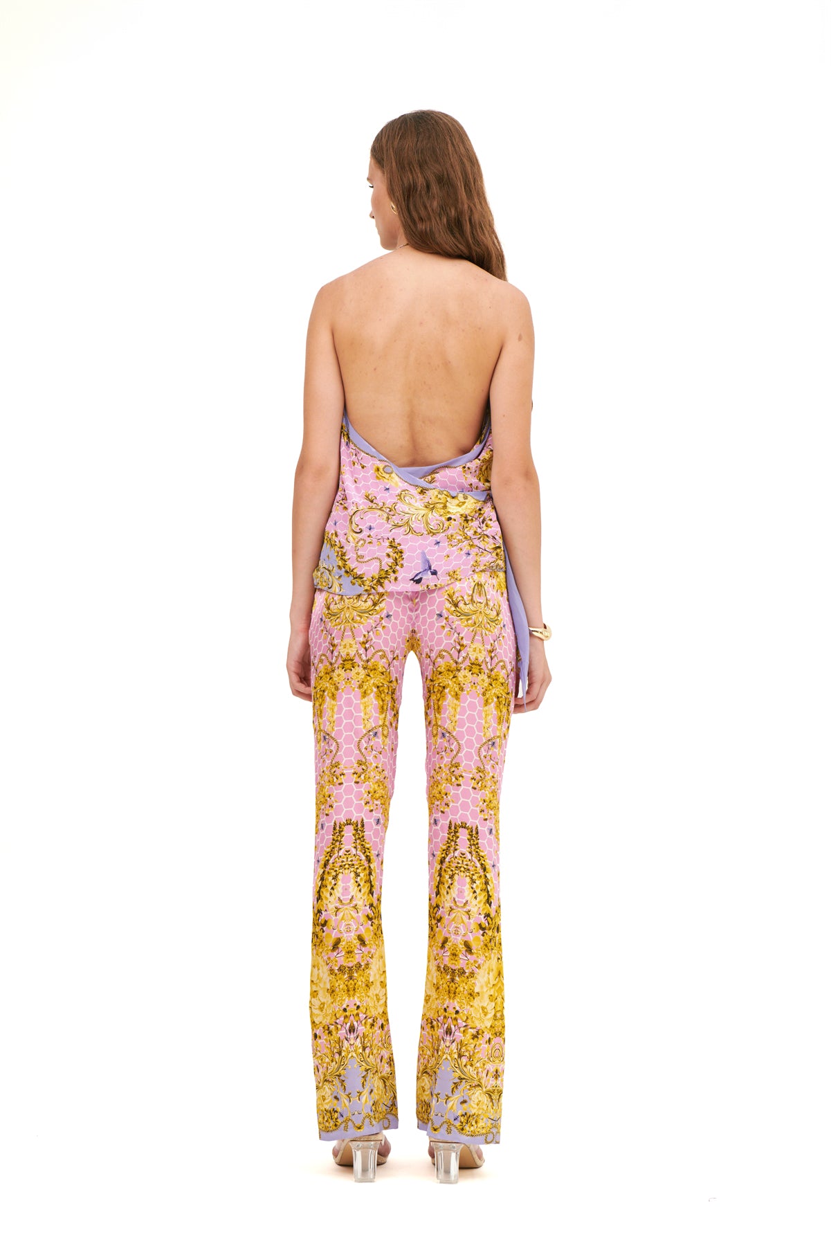 Draped halter top with a flattering neckline and flowing design for a chic, relaxed look.