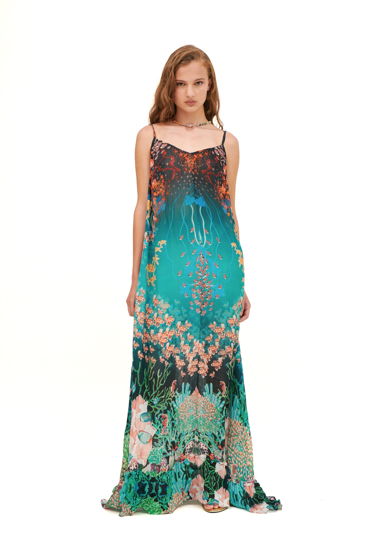 Flared V-neck dress with a flowing silhouette and flattering fit.