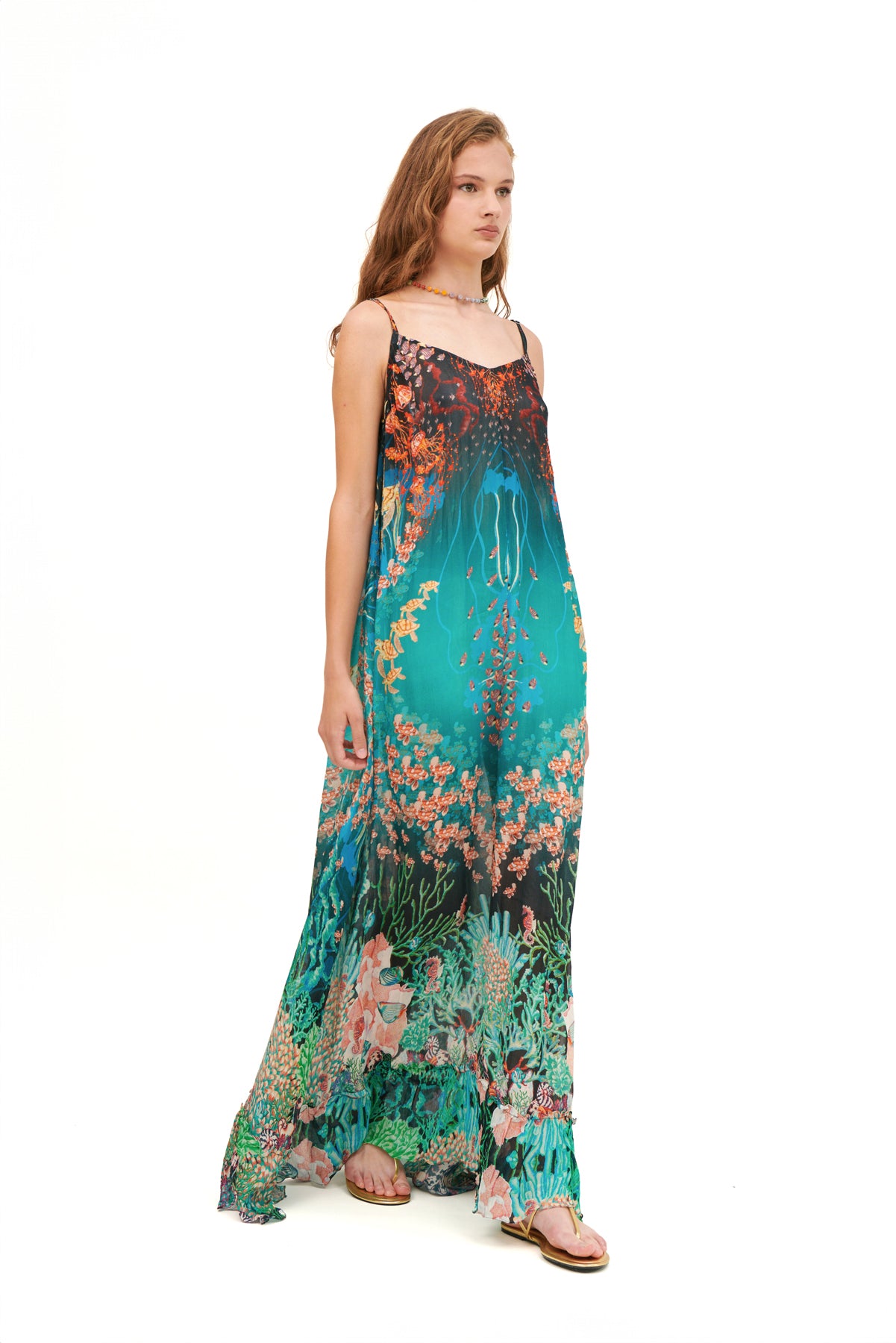 Flared V-neck dress with a flowing silhouette and flattering fit.