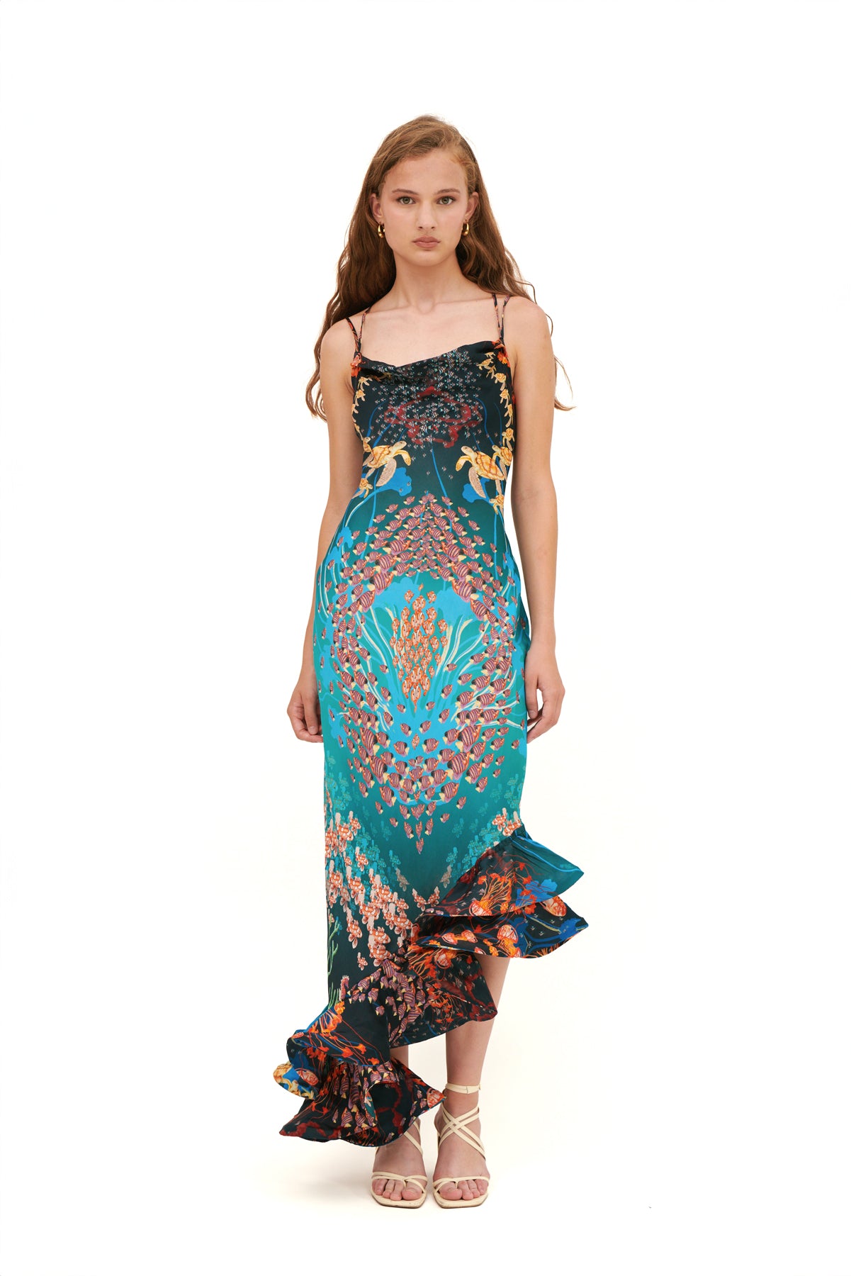 Long dress with curled hem detail.