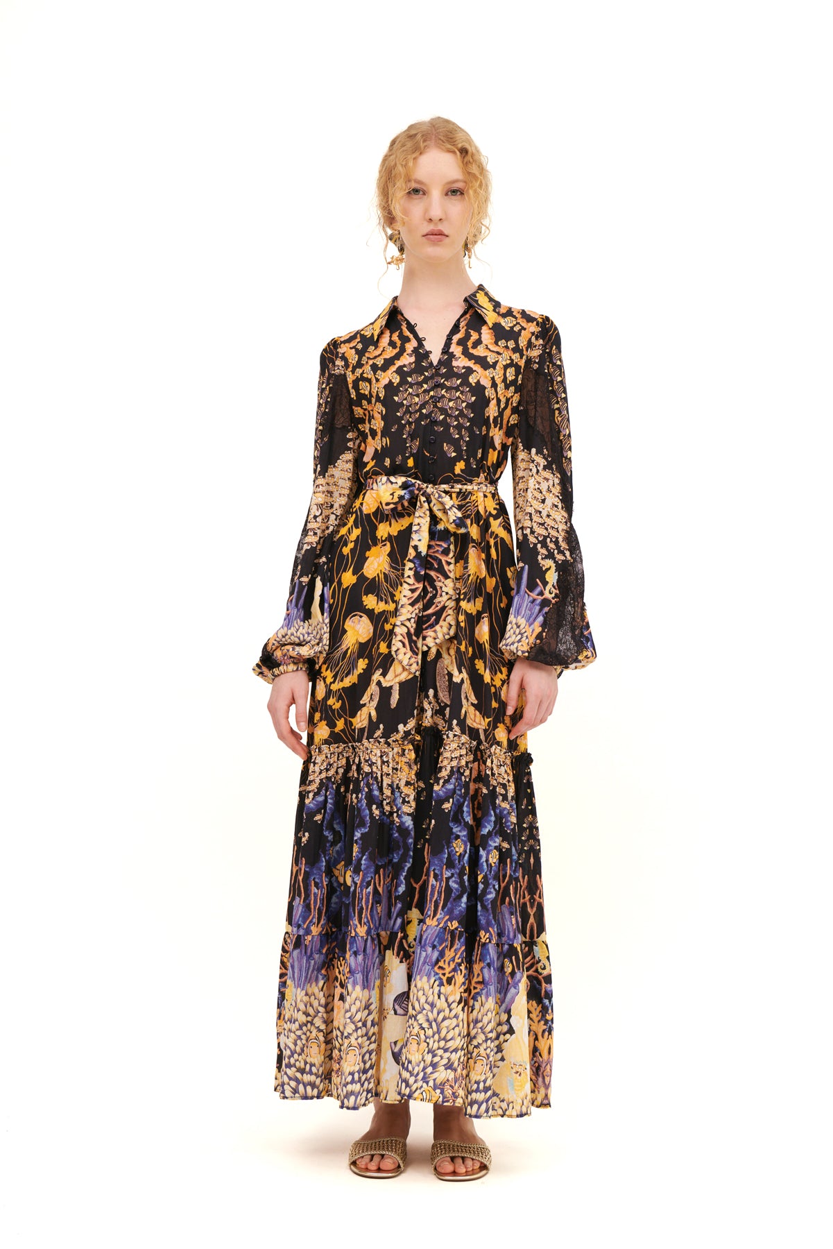 Chemisier with lace sleeve inserts for a chic and feminine touch.
