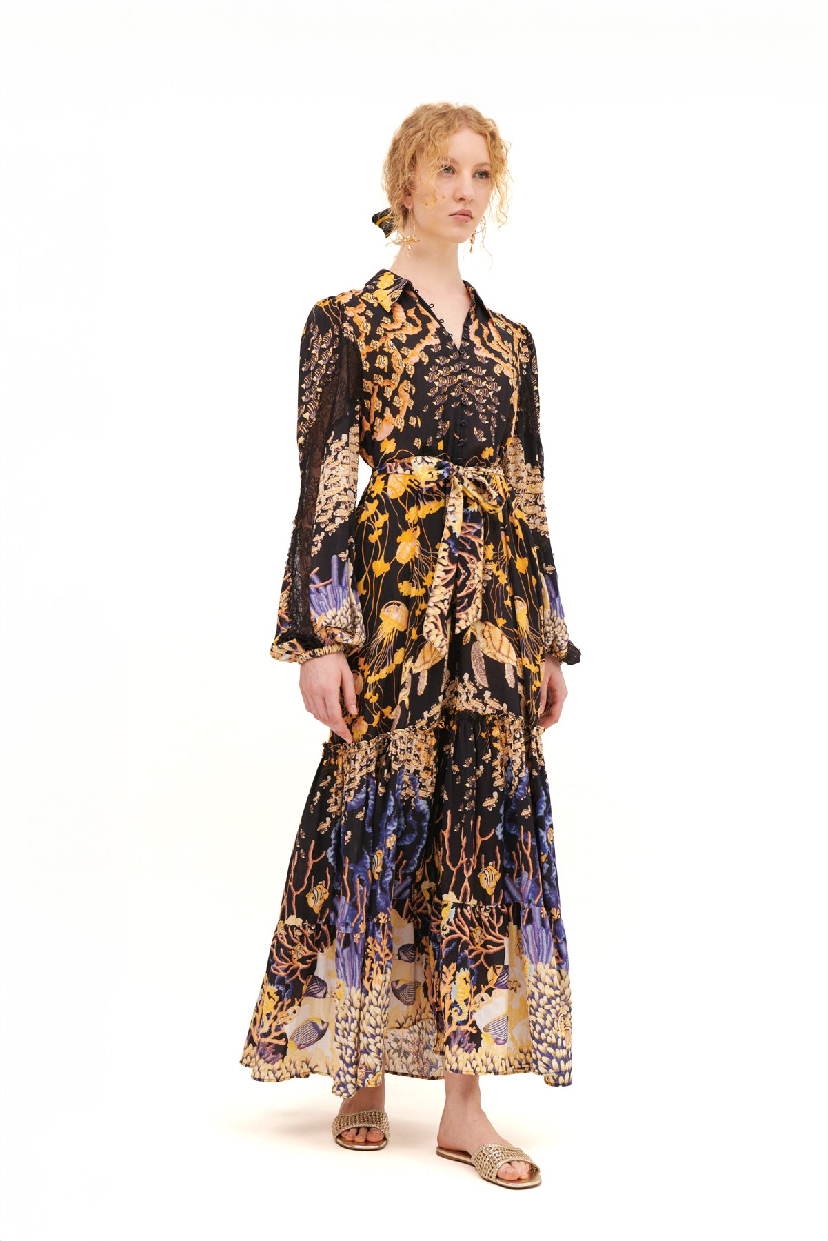 Chemisier with lace sleeve inserts for a chic and feminine touch.