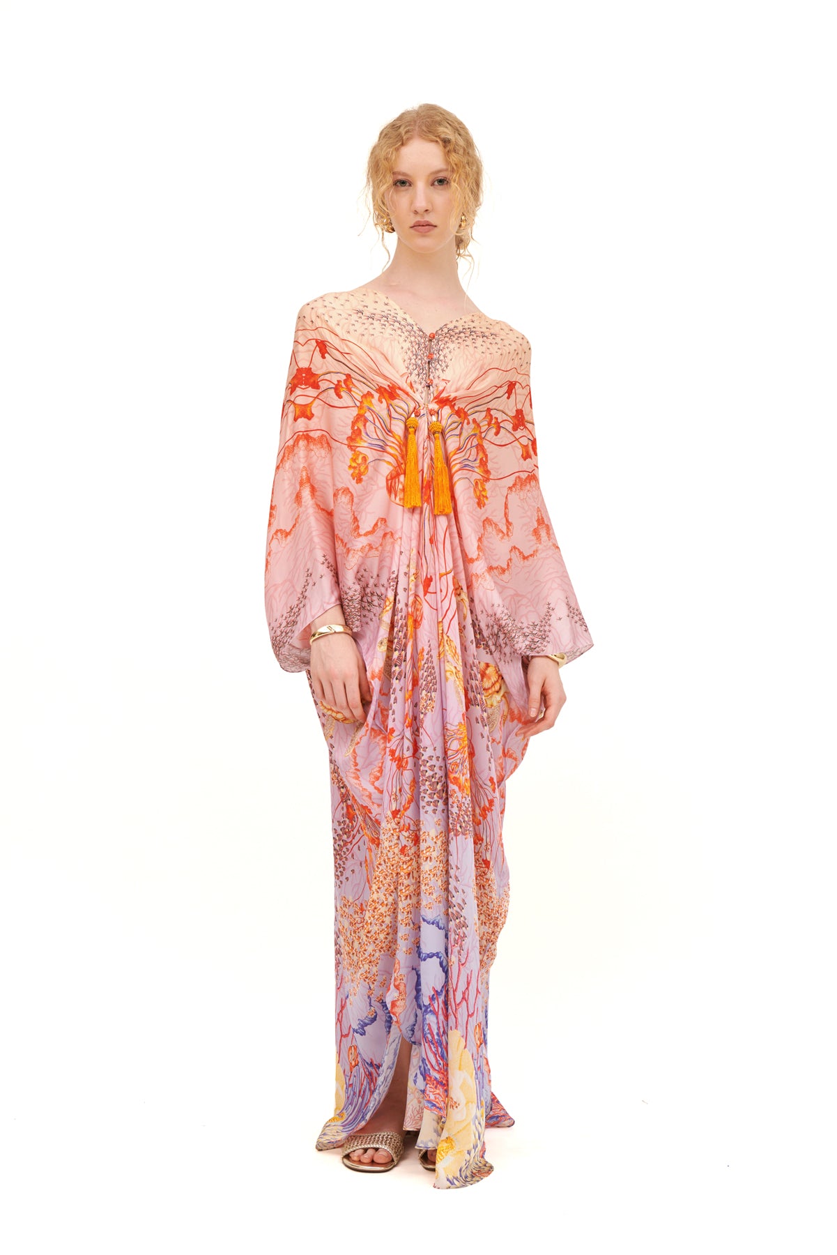 Stella gathered cover-up with a flowing silhouette and gathered details, perfect for beachside lounging or casual outings.