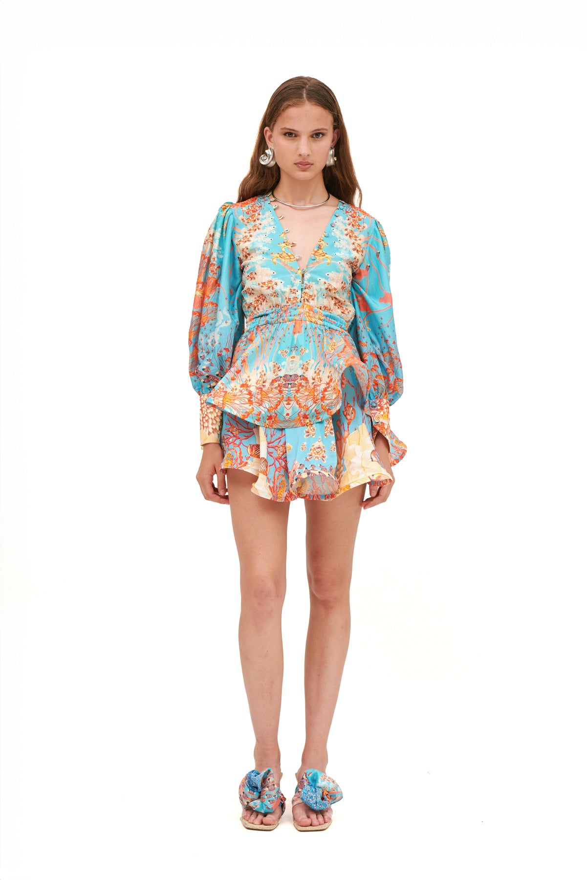 Aria mini dress with a flattering fit and playful design, perfect for casual outings or special occasions.