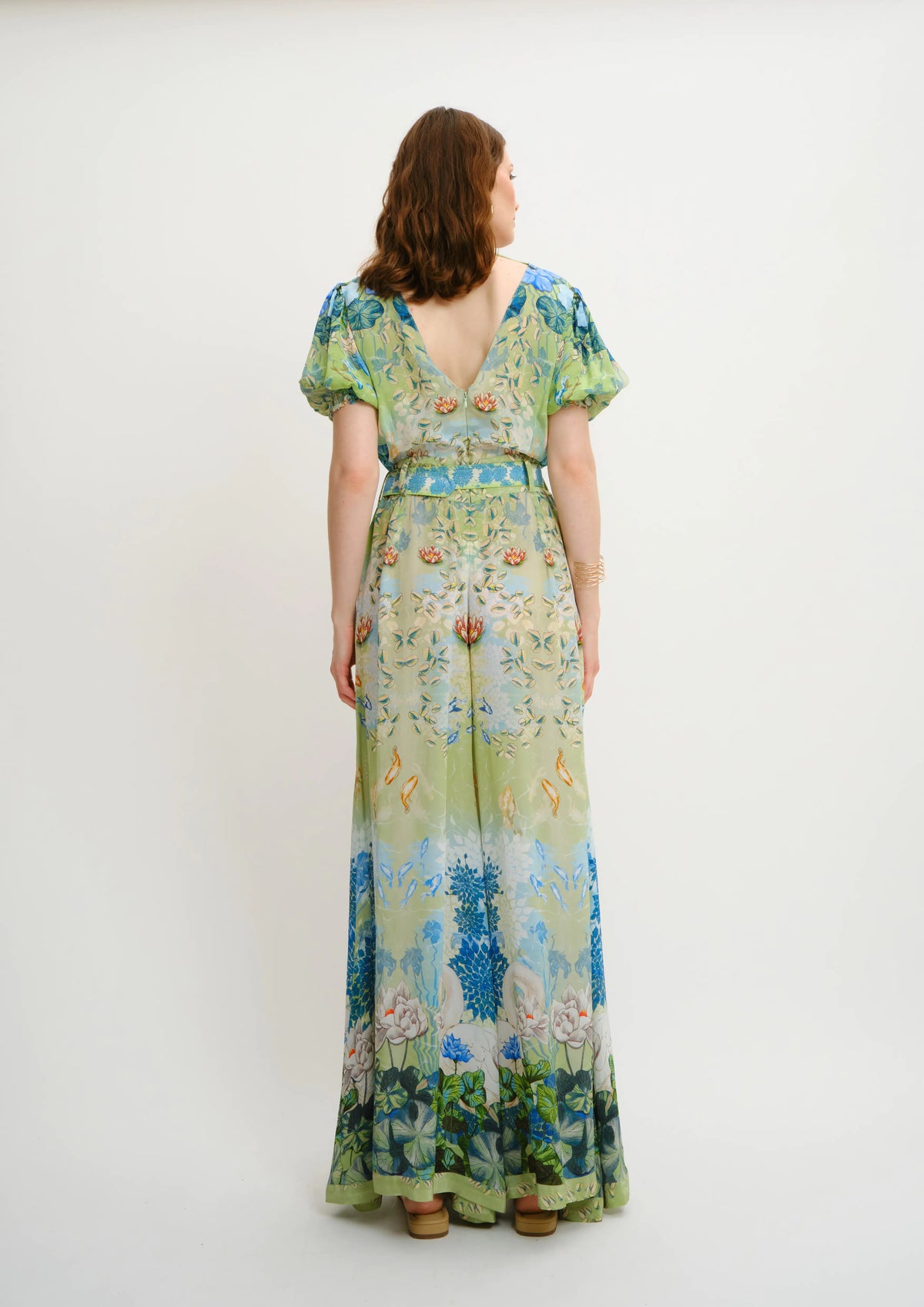 Model wearing koré collections Jardin du Jour floral print on the Parisian Summer jumpsuit