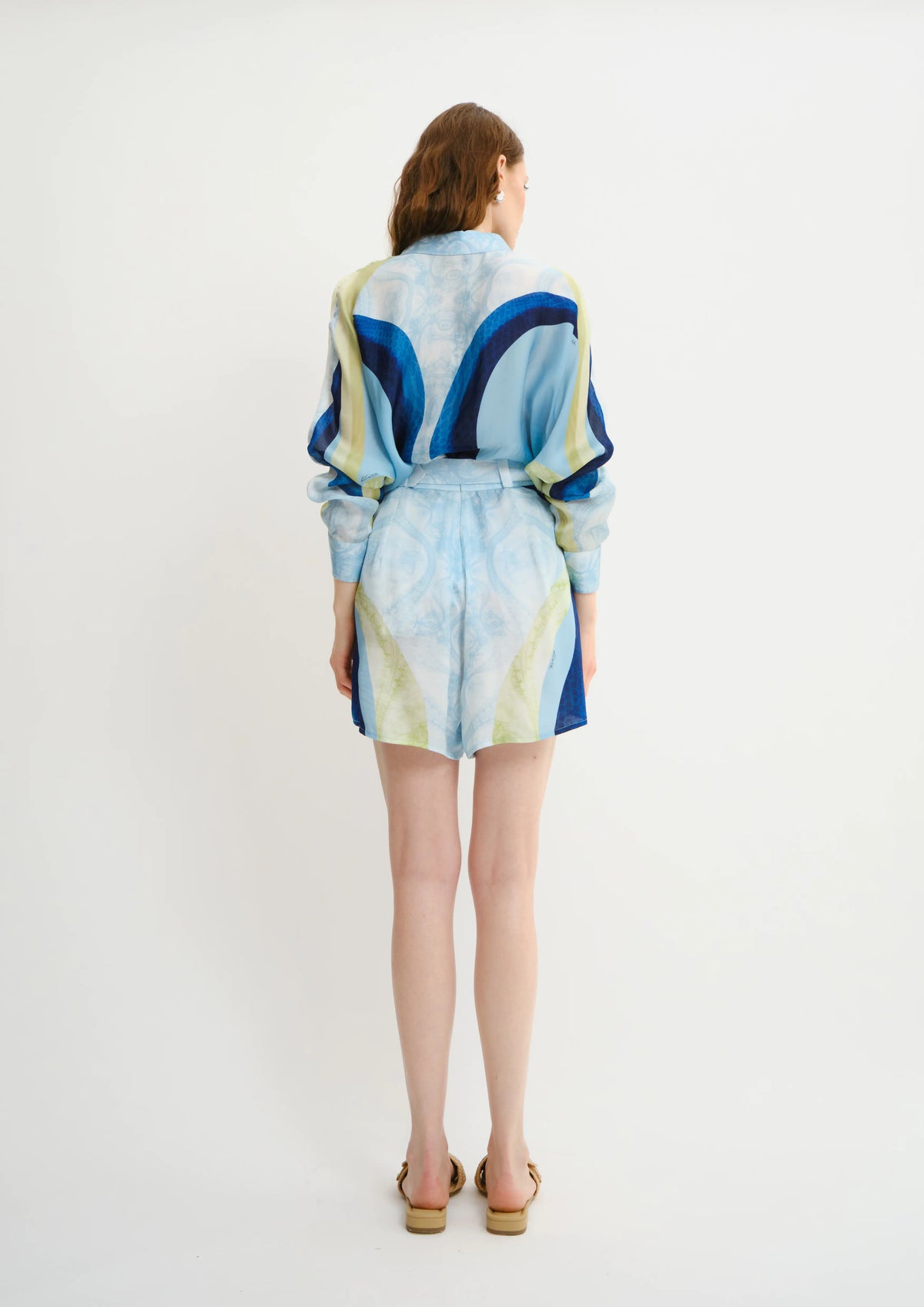Back view of the Sahara Sera Ruffle Shirt by Koré Collections