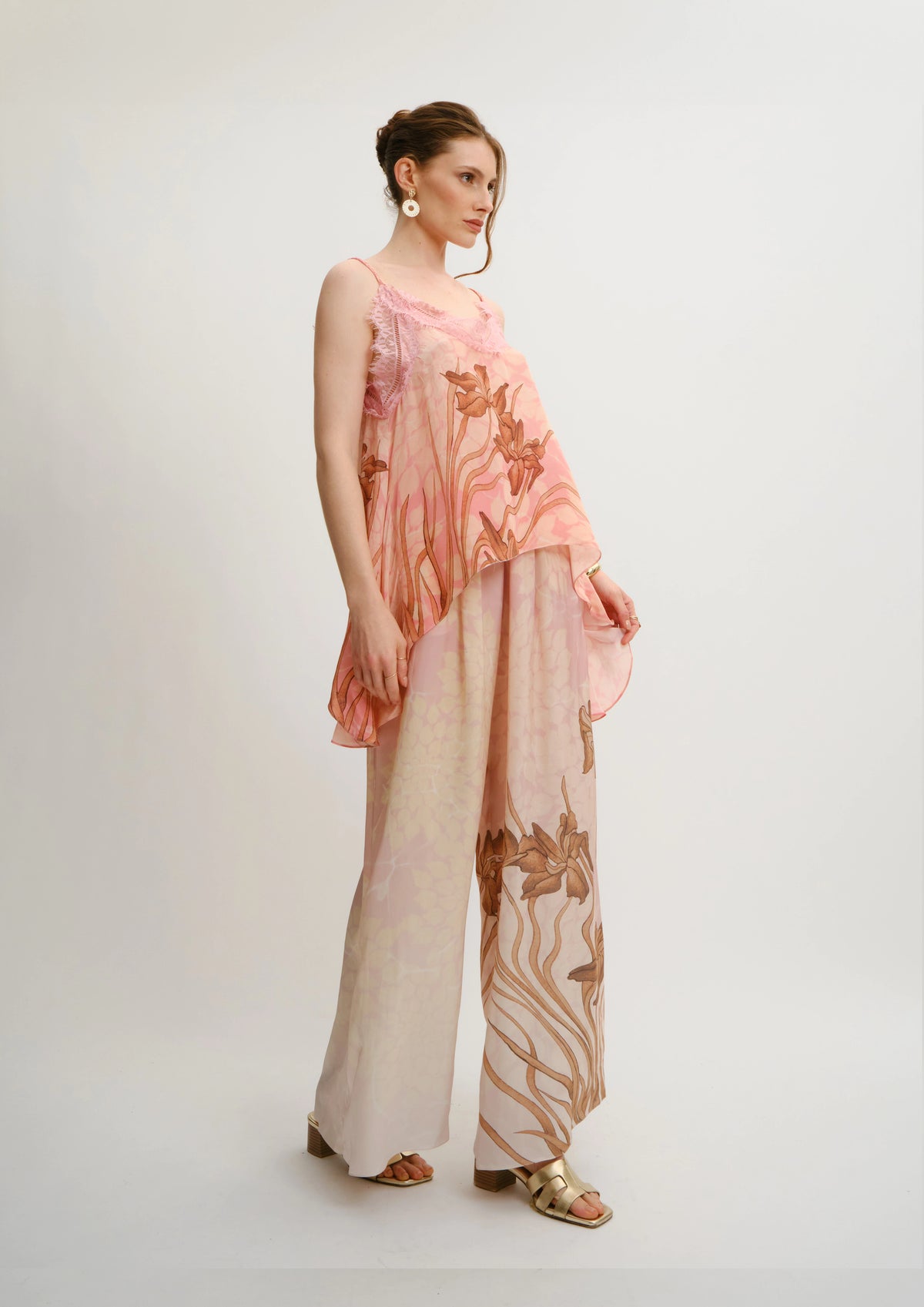 Model wearing Koré Collections Lounge Trousers in the Jardin au Soleil print side view