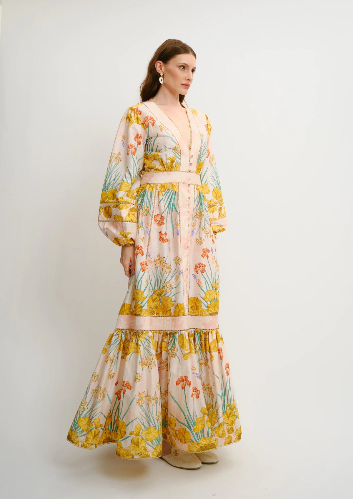 Model wearing Koré Collections Poesia Maxi Chemisier in the Jardin au Soleil print.