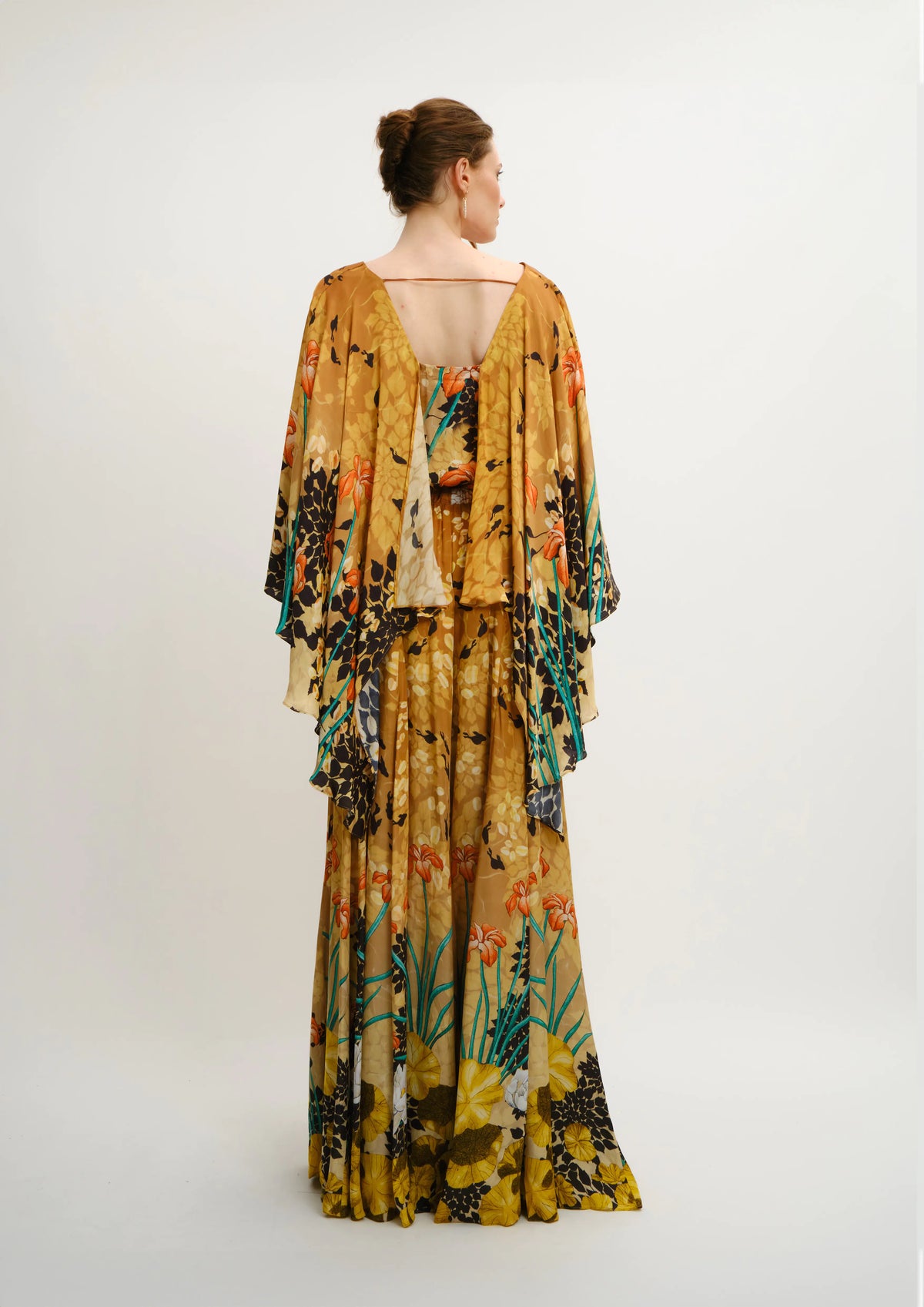 Koré Collections Jardin de Lune printed V-neck batwing sleeve dress in cherry satin, back view.