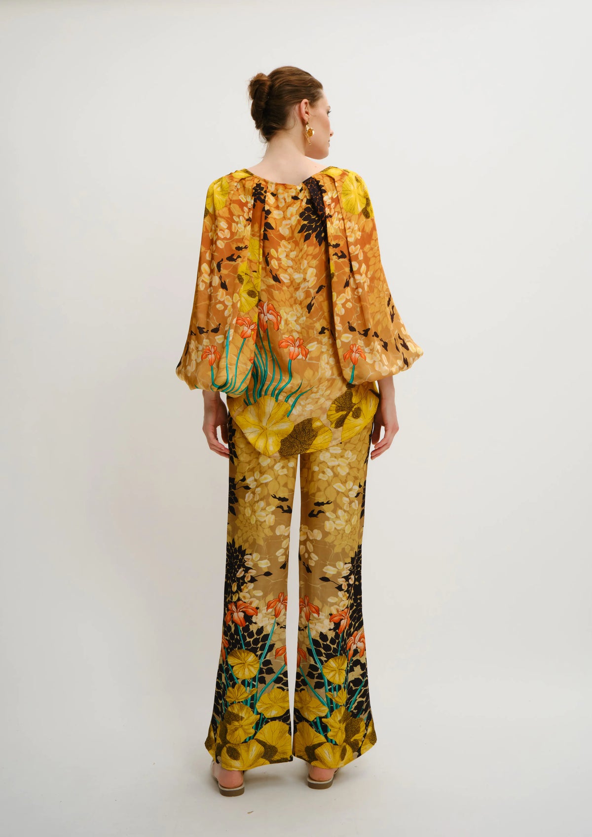 Back view of Jardin de Lune straight-fit summer trousers by Koré Collection