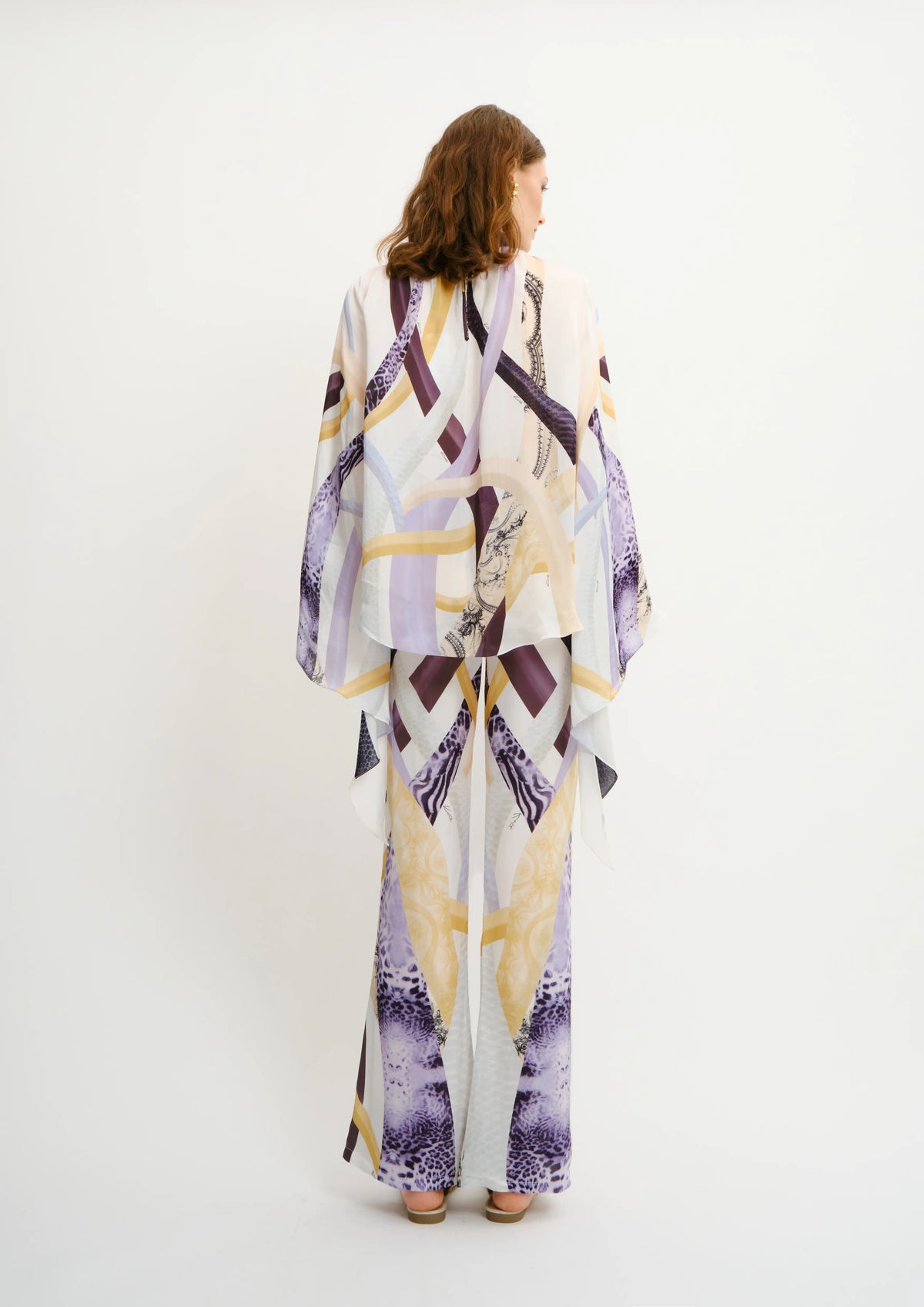 Back view of Sahara Notte straight-fit summer trousers by Koré Collections