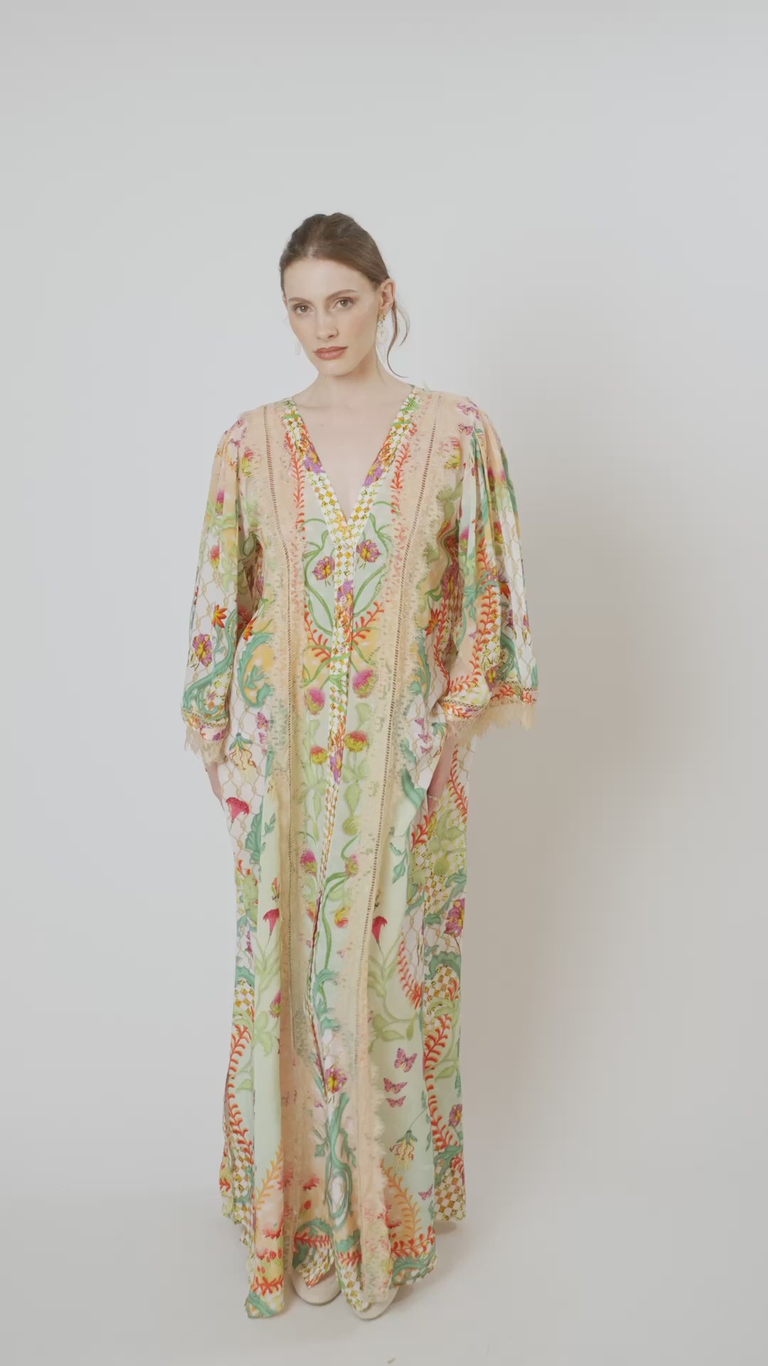 Koré Collections Endless Summer Cover-Up with Lace in the Blooming Day print, showcasing its fluid silhouette, delicate lace detailing and lightweight fabric for elegant resortwear.