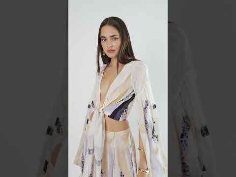 Sahara Notte Triangle Maxi Skirt by Koré Collections, showcasing its fluid natural crepe fabric and elegant maxi silhouette.